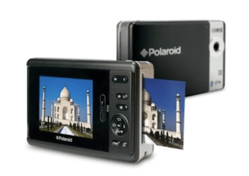 Polaroid camera printing an image of the Taj Mahal
