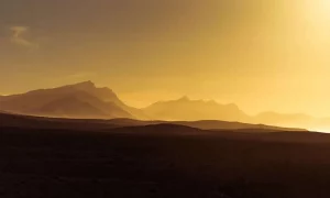 Landscape with mountains and a yellow sky